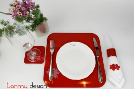 Red rectangular lacquer box included with 6 placemats, 6 coasters and 6 napkin rings with lotus pattern